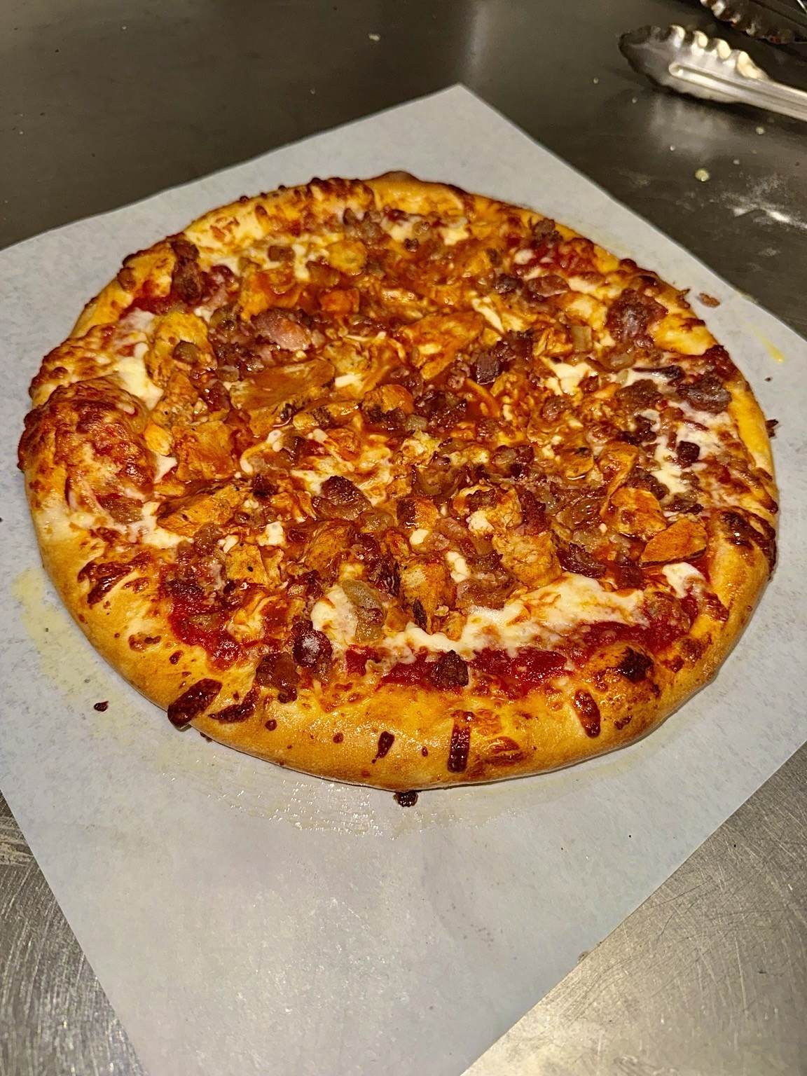 Loaded buffalo chicken specialty pizza