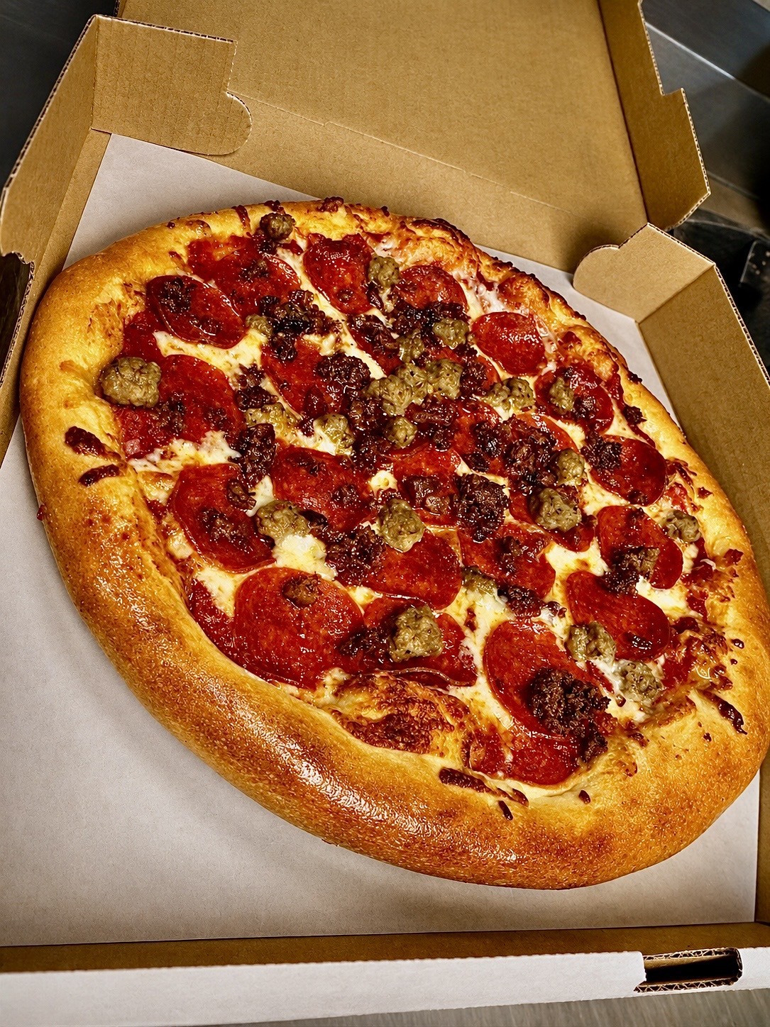 Pepperoni and sausage pizza from Porky's Pizza